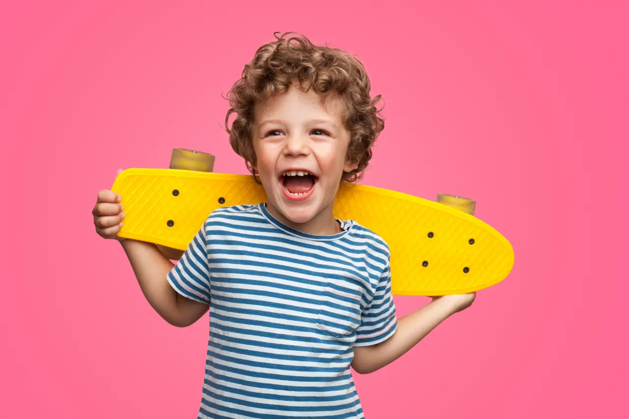 Children learning through play with skateboard at Funky Nursery & Pre-School in Cheltenham