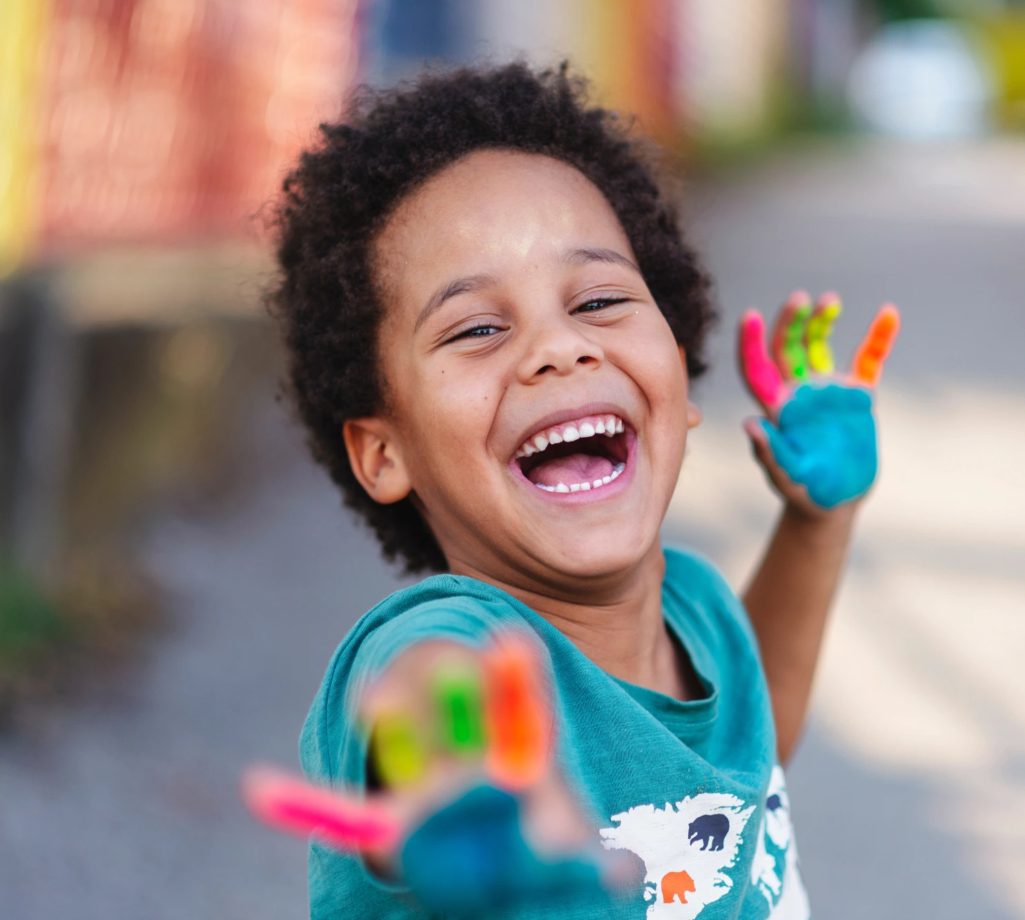 Happy child enjoying colourful creative play at Funky Nursery & Pre-School in Cheltenham